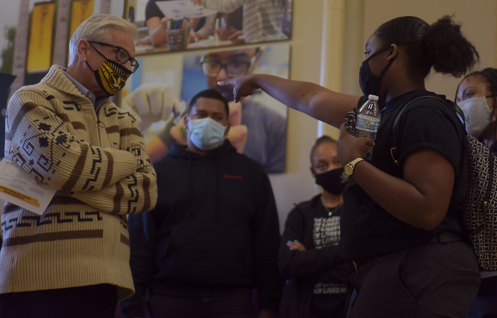 A protester confronts Bill Stackman inside of Jesse Hall on Friday